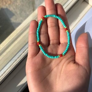 Bright light blue beaded bracelet